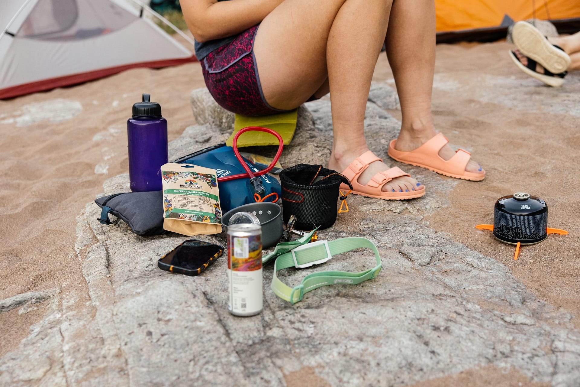 Hungry Hiker dehydrated meal and camping gear at a hiking camp