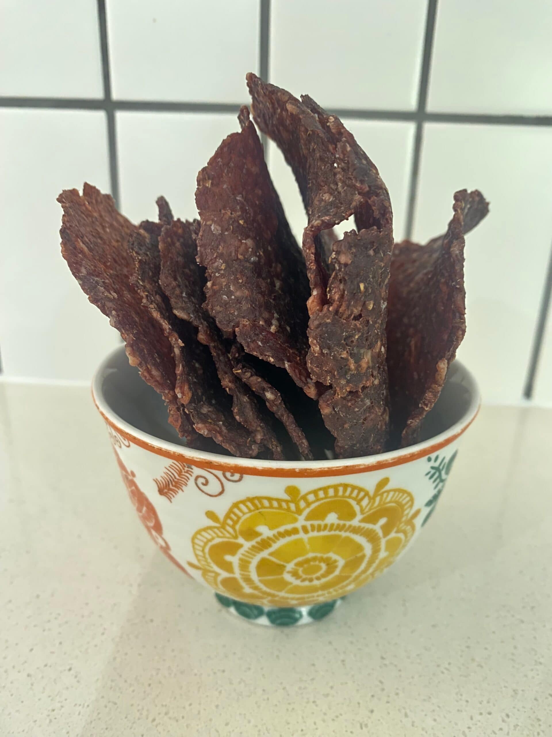 Homemade dried beef pieces ready for a hiking trail snack